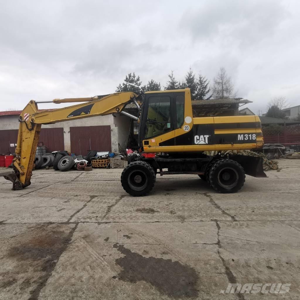 CAT M 318 B Bageri točkaši