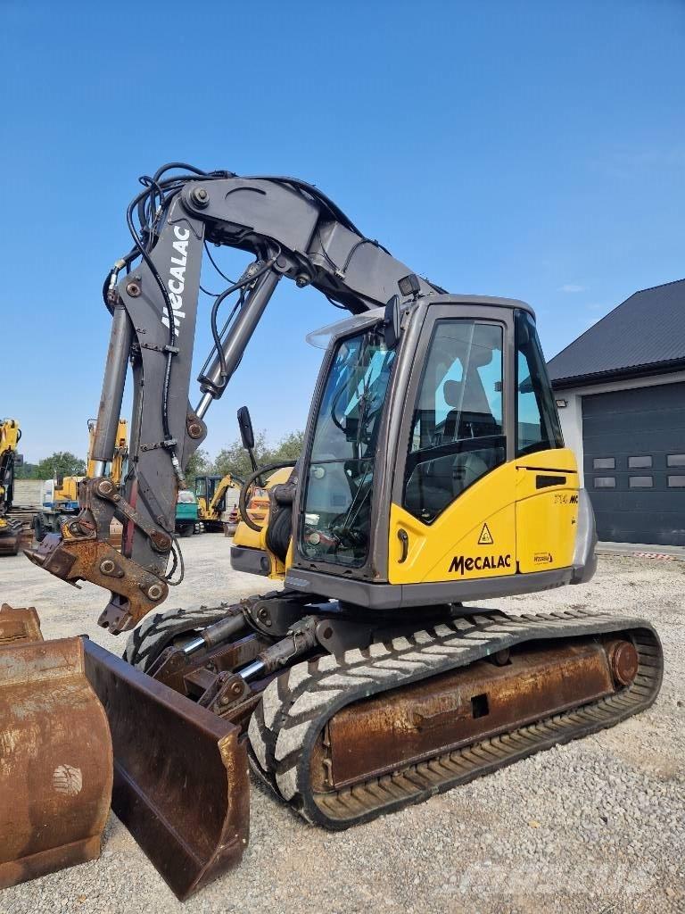 Mecalac 714 MC Bageri guseničari