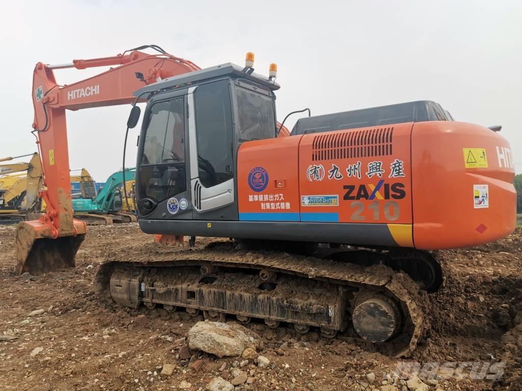 Hitachi zx210 Bageri guseničari
