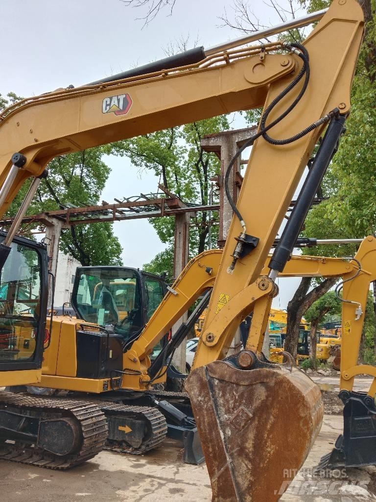 CAT 310 Bageri guseničari