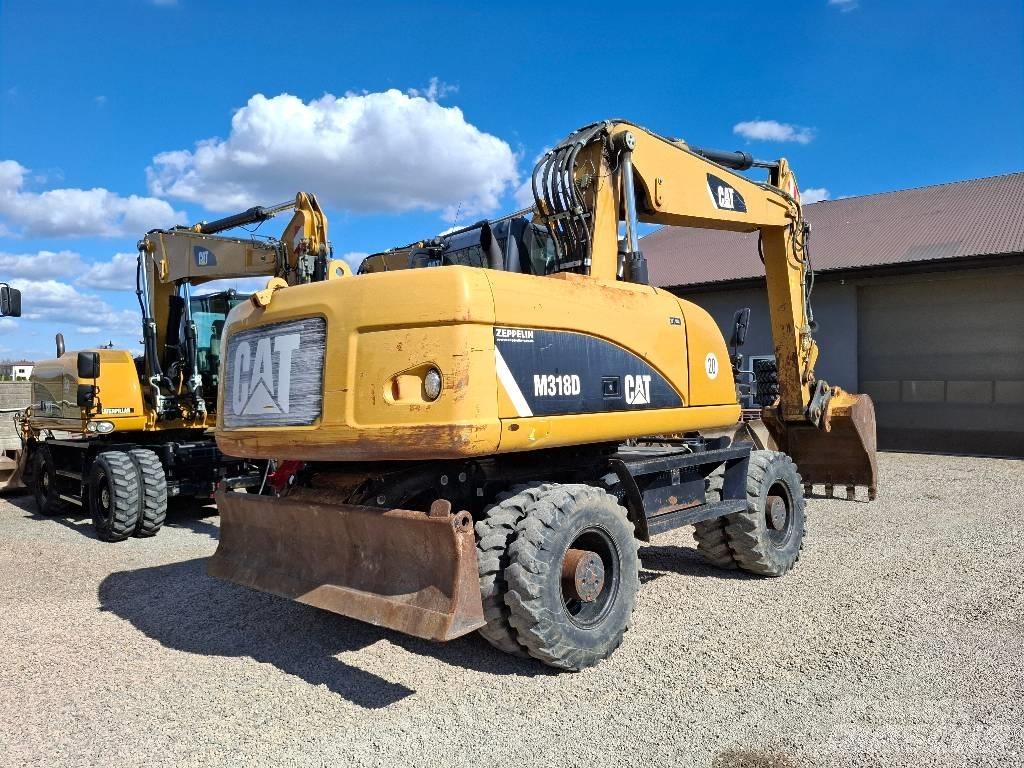 CAT 318 Bageri točkaši