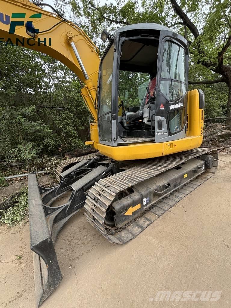 Komatsu PC128US Bageri guseničari