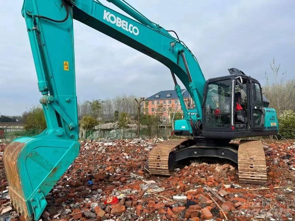 Kobelco SK210 Bageri guseničari