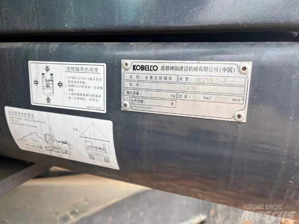 Kobelco SK210 Bageri guseničari