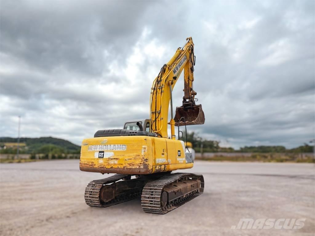 New Holland E 245 B Bageri guseničari