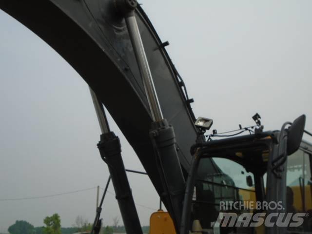 John Deere 450 DLC Bageri guseničari