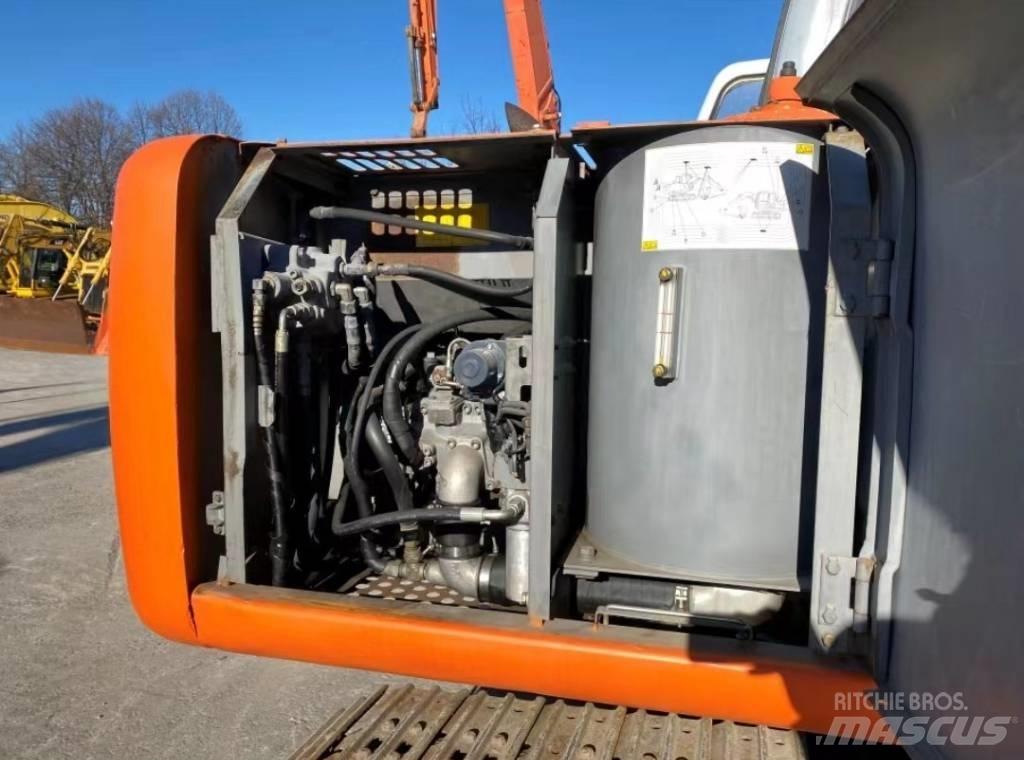 Hitachi EX 100 Bageri guseničari