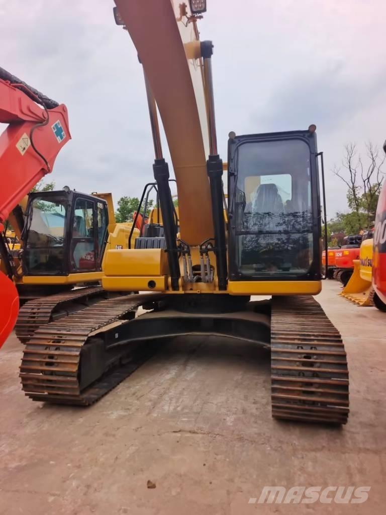 CAT 323 GC Bageri guseničari