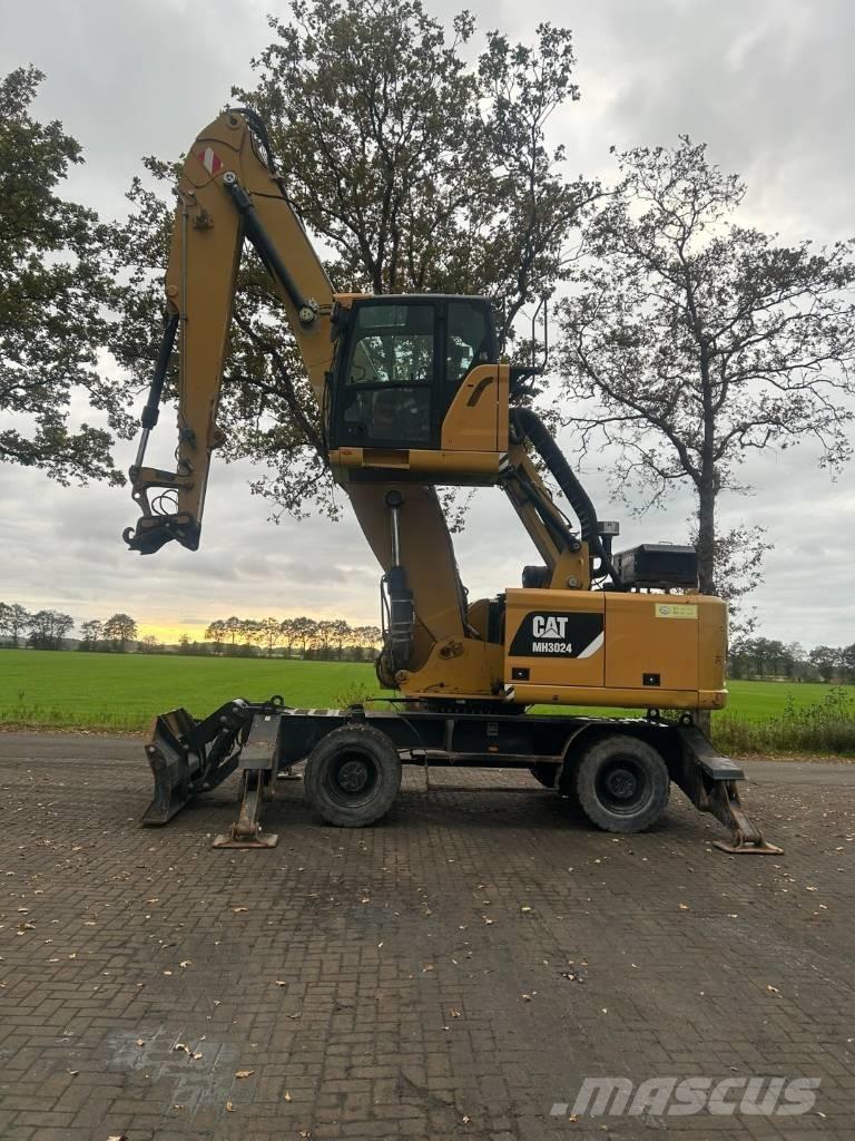 CAT MH 3024 Bageri za prenos primarnih/sekundarnih sirovina