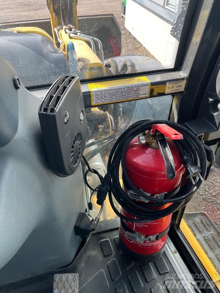 New Holland B 115 B Rovokopači