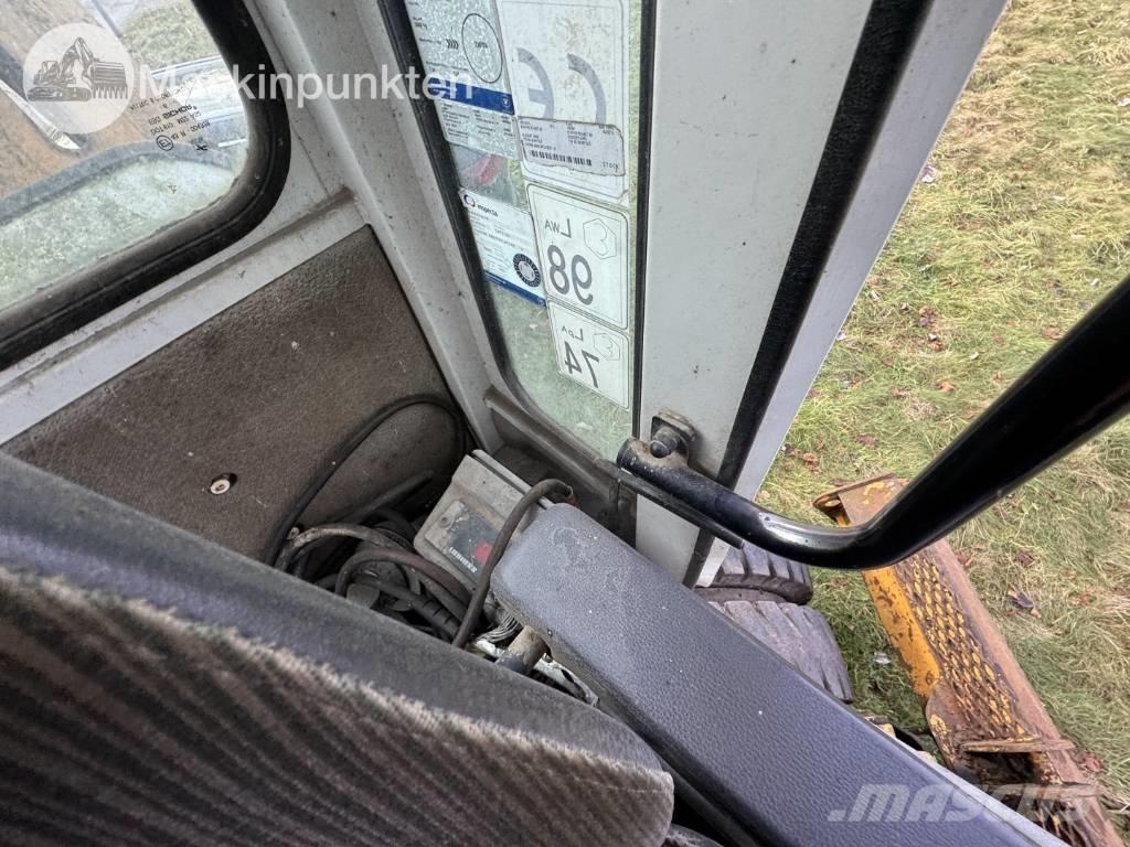 Liebherr A 310 B Bageri točkaši