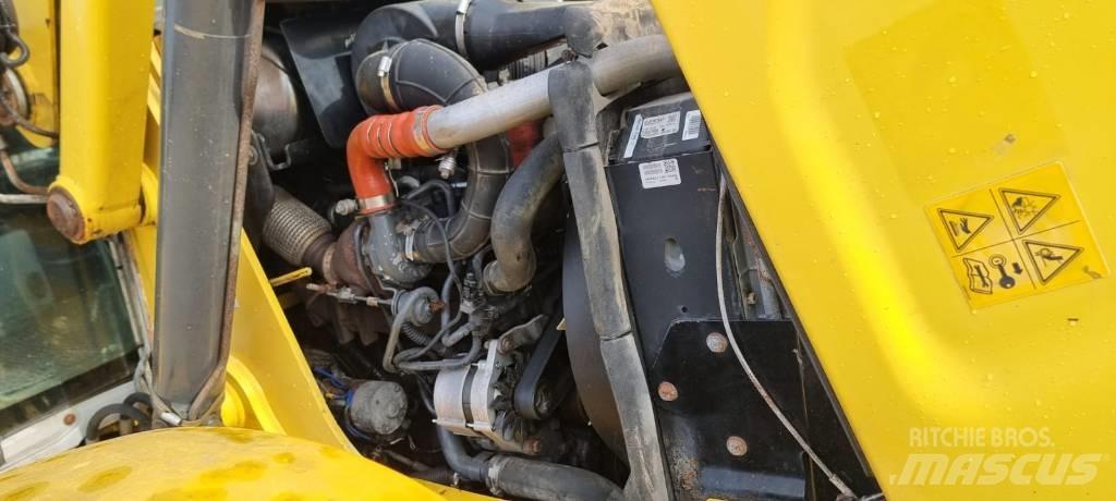 New Holland B 115 C Rovokopači