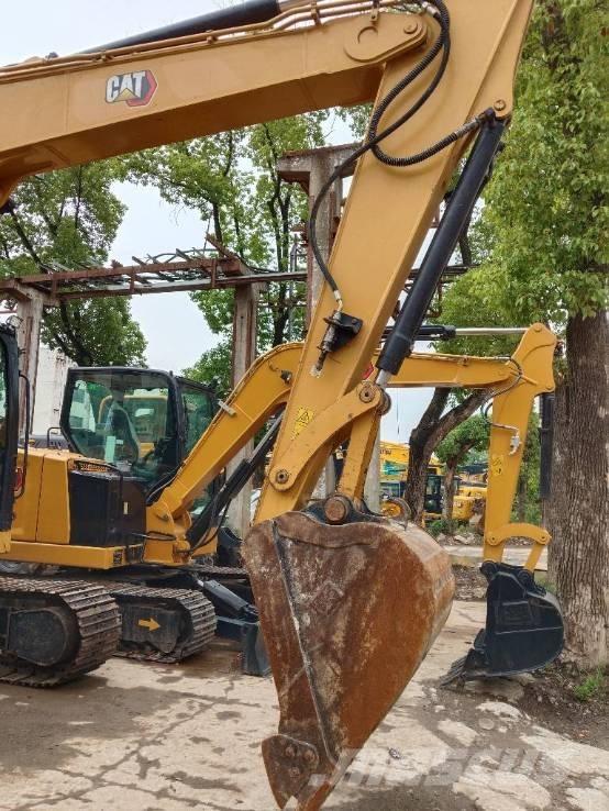 CAT 310 Bageri guseničari