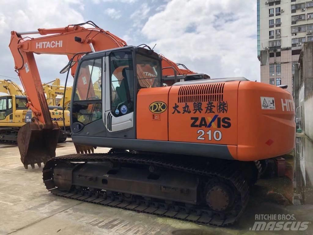 Hitachi zx210 Bageri guseničari