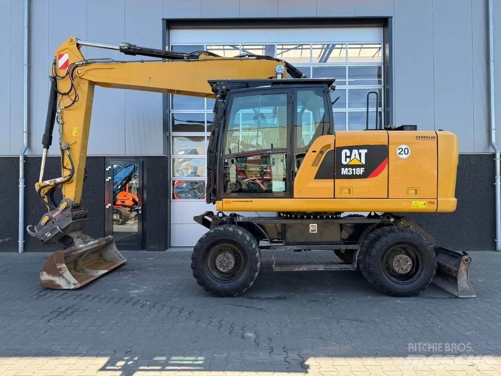 CAT M318F Bageri točkaši