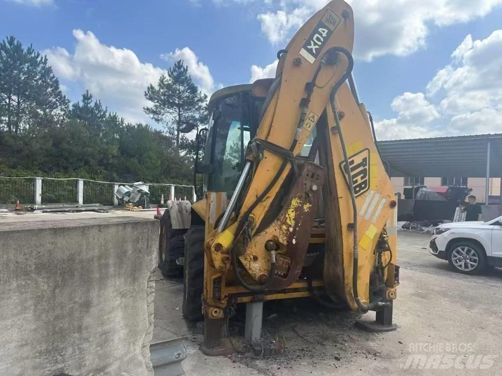 JCB 4 CX Bageri guseničari