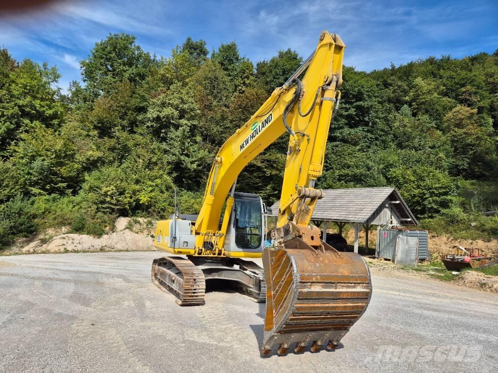 New Holland E 215 Bageri guseničari