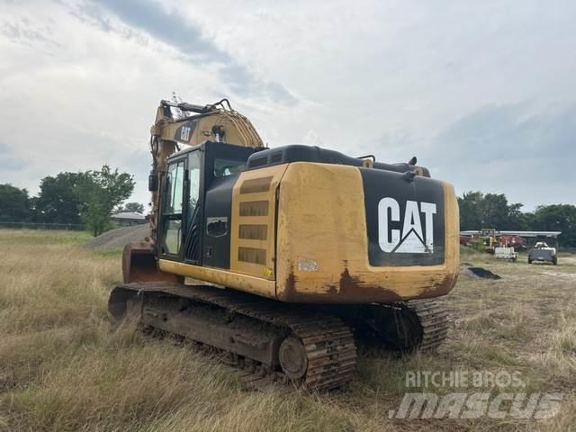 CAT 323FL Bageri guseničari
