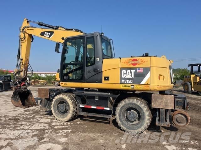 CAT M315D Bageri točkaši