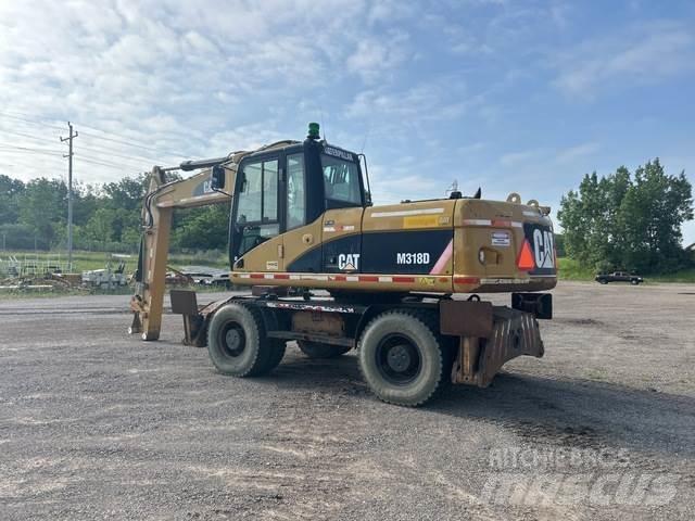 CAT M318D Bageri točkaši
