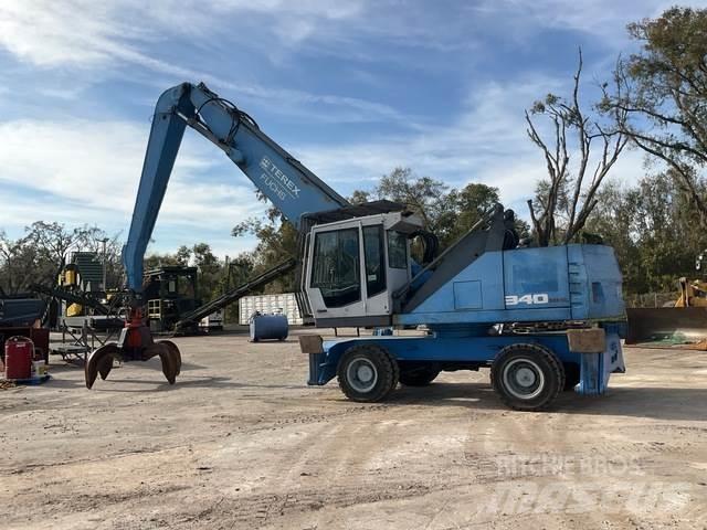 Fuchs MHL340 Bageri za prenos primarnih/sekundarnih sirovina