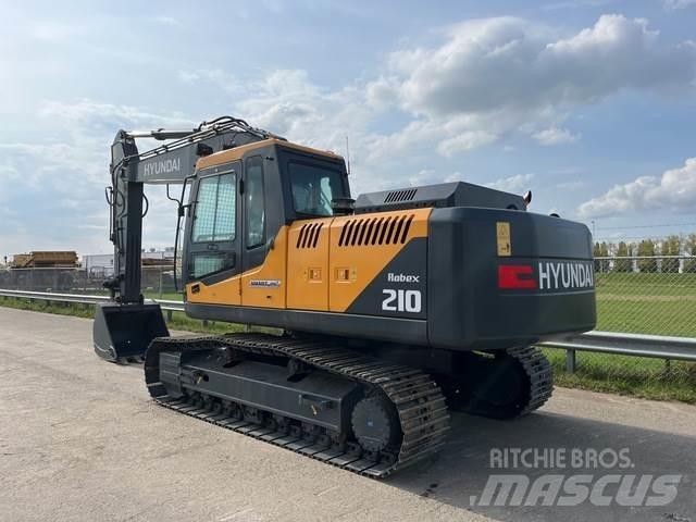 Hyundai R210 Bageri guseničari