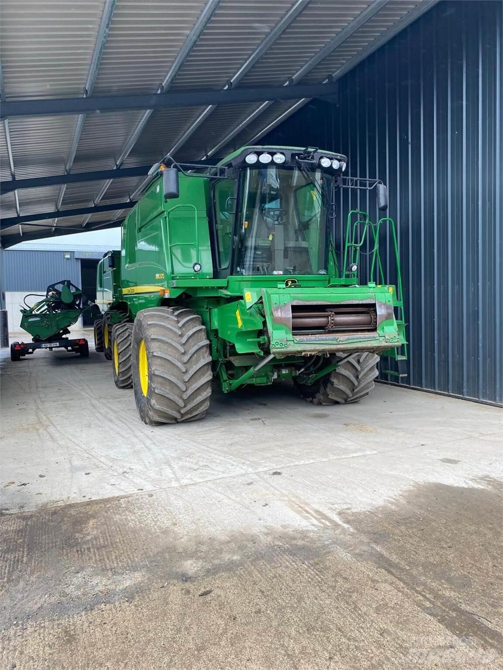 John Deere C670 Kombajni