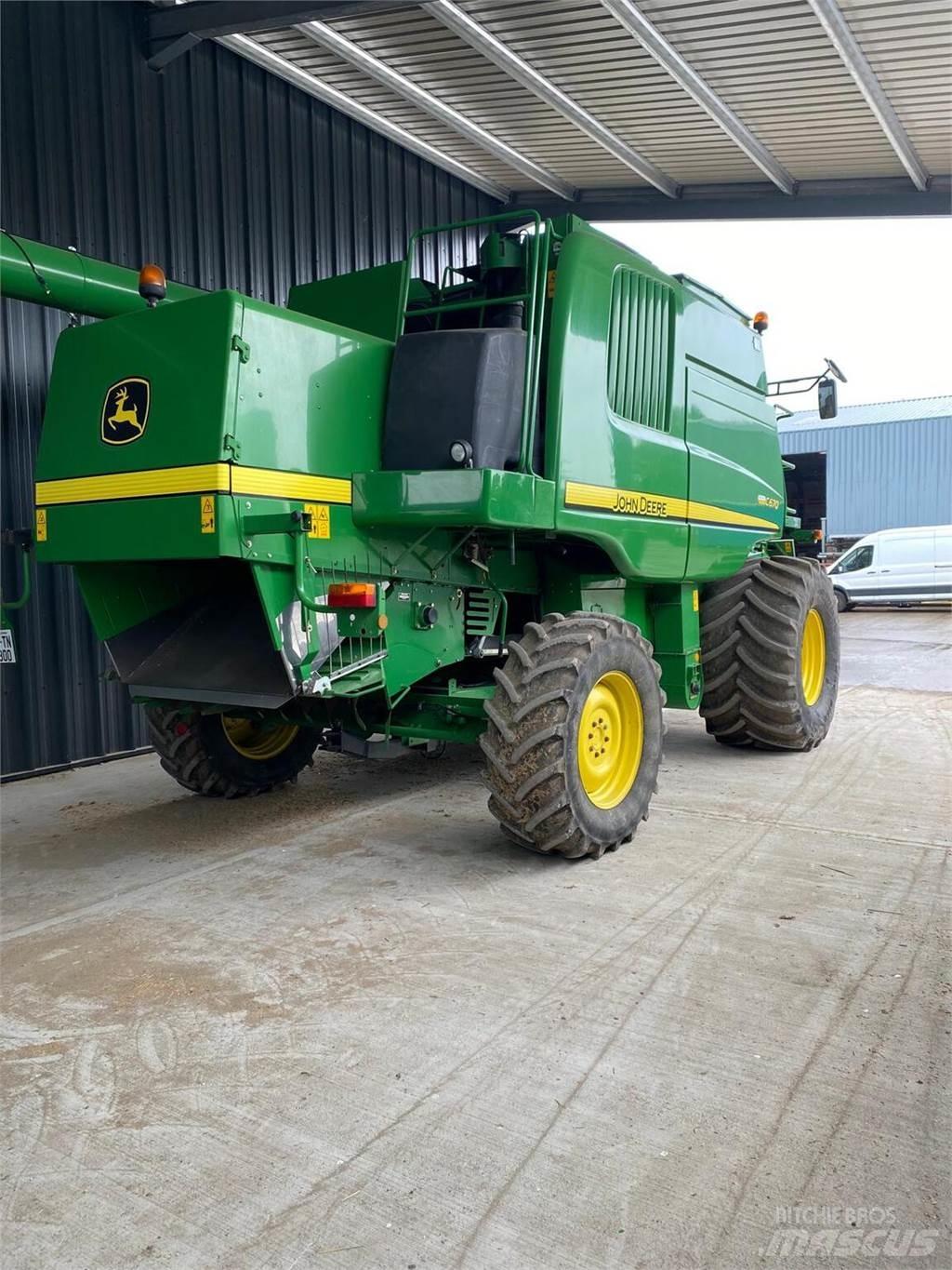 John Deere C670 Kombajni