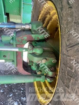 John Deere C670 Kombajni
