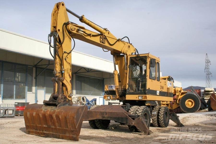 CAT 214B Bageri točkaši
