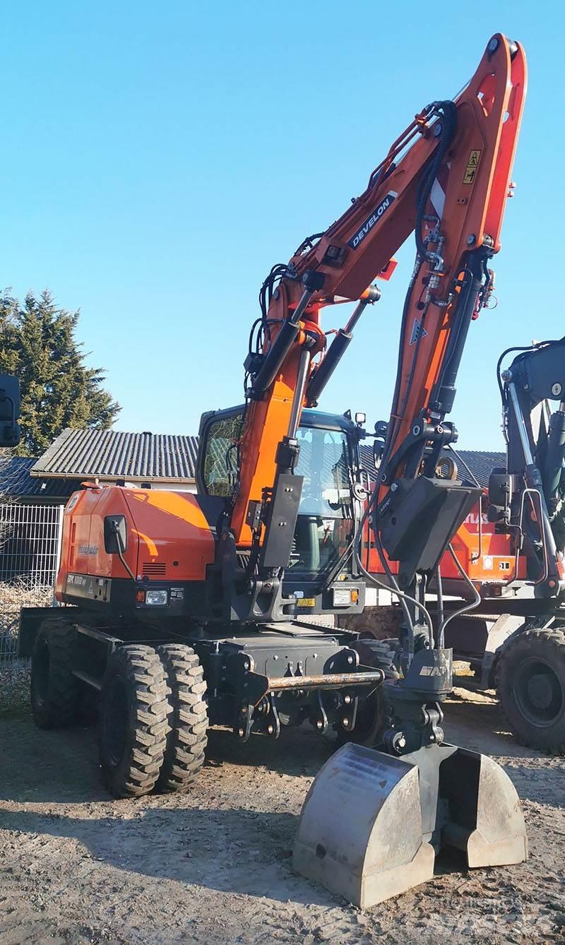 Develon DX 100 W-7 Bageri točkaši