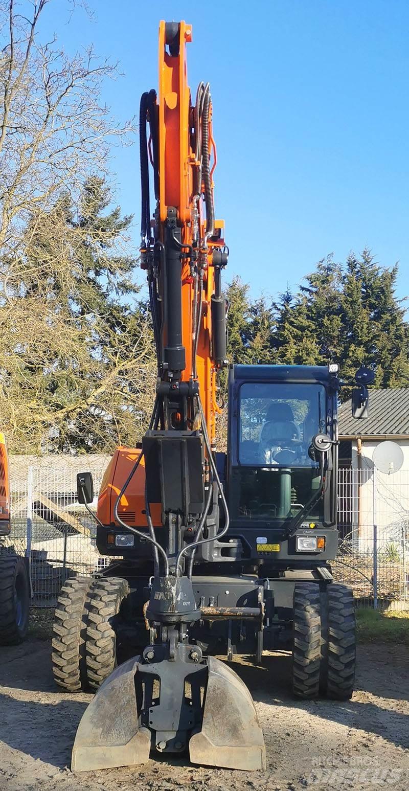 Develon DX 100 W-7 Bageri točkaši