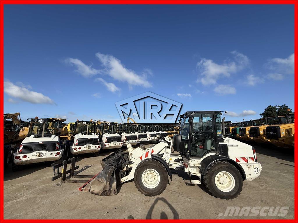 CAT 908M Utovarivači na točkove