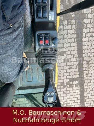 CAT MH 3022 Bageri točkaši