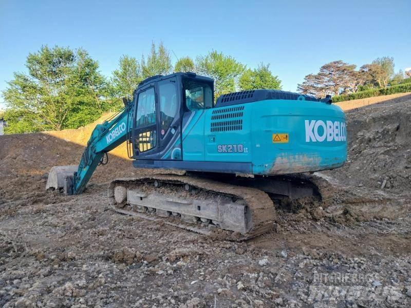 Kobelco SK210 Bageri guseničari