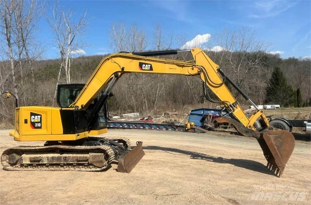 CAT 310 Mini bageri < 7t