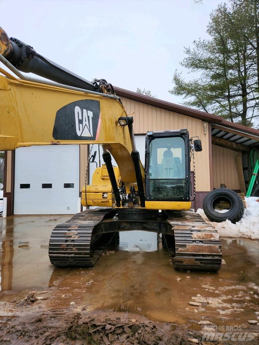 CAT 320DL Bageri guseničari