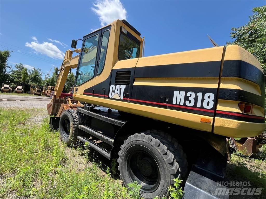 CAT M318 Bageri točkaši
