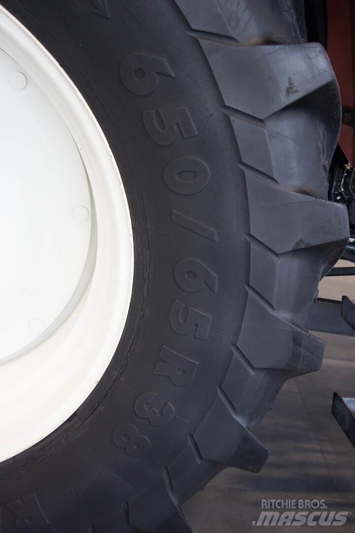 New Holland M135 Traktori