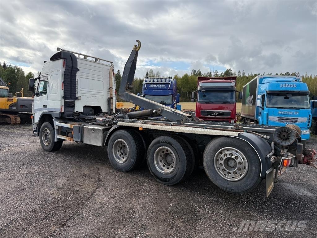 Volvo FM 12 8x4 Rol kiper kamioni sa kukom za podizanje tereta