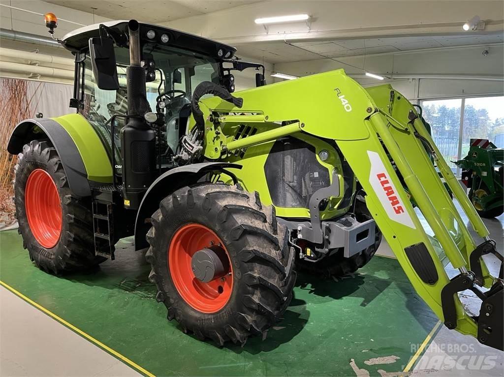 CLAAS Arion 660 Traktori