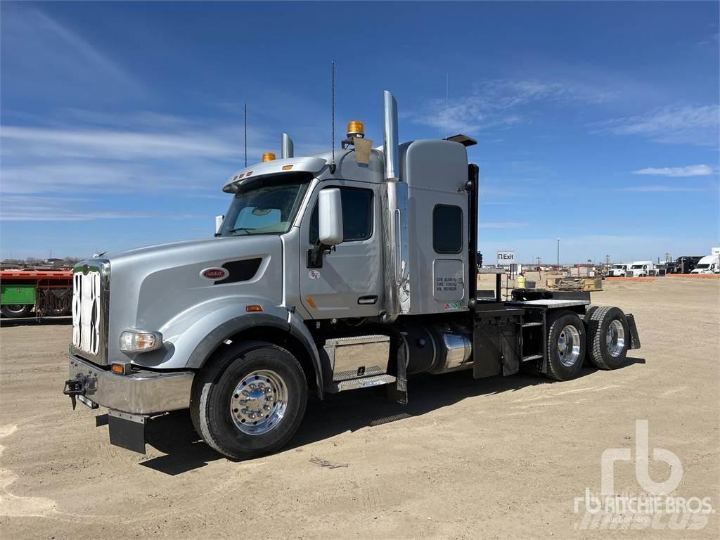 Peterbilt 567 Kamioni sa ravan platformom / vitlom