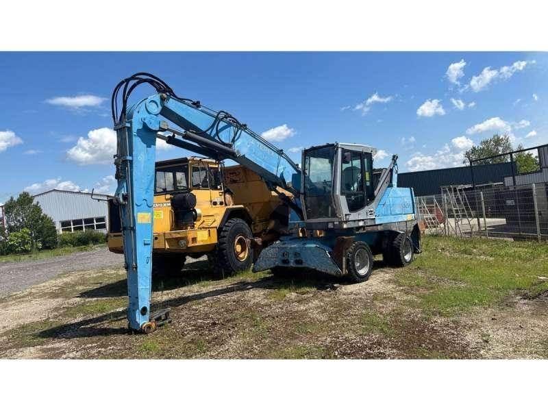 Fuchs MHL320 Bageri za prenos primarnih/sekundarnih sirovina