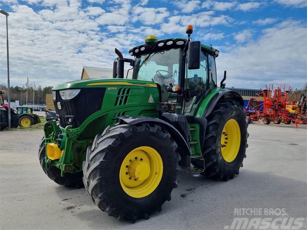 John Deere 6215R +FL+FPTO Traktori